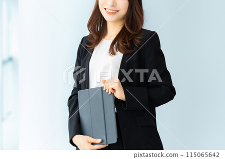 Smile business woman with tablet Smile business woman with tablet 115065642