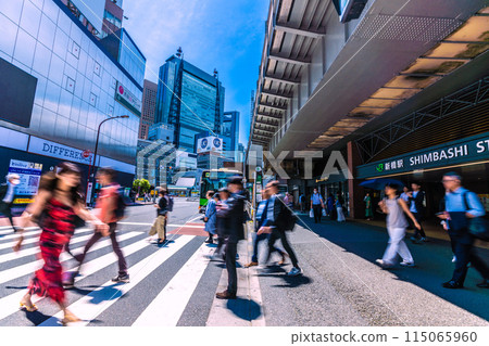 Tokyo cityscape in Japan. Summer-like sunshine...view of Shinbashi Station (Ginza exit) and other areas. The buildings of Shiodome are in the background on the left. May 30th. 115065960