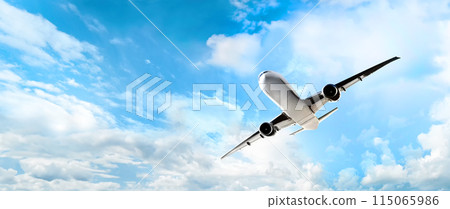 White passenger airplane is flying high in the clear blue sky, symbolizing freedom and adventure White passenger airplane is flying high in the clear blue sky, symbolizing freedom and adventure 115065986