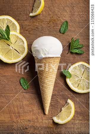 Lemon ice cream and lemon slices 115066428