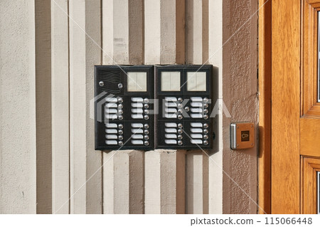 Intercom on a block of flats entrance door Intercom on a block of flats entrance door 115066448