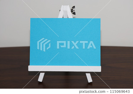 Light blue paper and stand 115069643