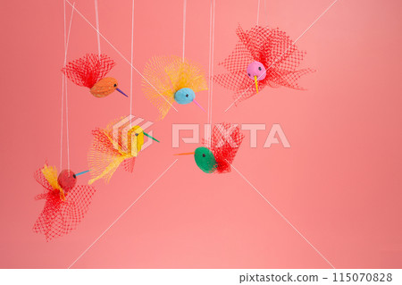 a fun DIY project, crafting peanut hummingbird toys. This simple homemade activity not only entertains but also teaches recycling concepts,  115070828