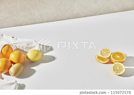 Colorful color background. Refreshing and fresh oranges, lemons and other fruits full of vitamins. 115072578