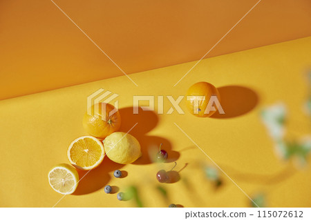 Colorful color background. Refreshing and fresh oranges, lemons and other fruits full of vitamins. Colorful color background. Refreshing and fresh oranges, lemons and other fruits full of vitamins. 115072612