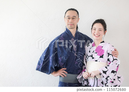 A couple wearing yukata A couple wearing yukata 115072680
