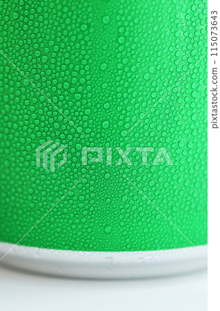 water drop on green beverage cans background, texture of cold aluminium drink package 115073643