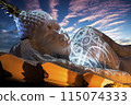 Nirvana white marble reclining Buddha, beautiful sky background. 115074333