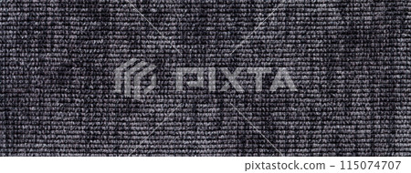 Texture of dark gray background from soft textile material. Abstract black backdrop from fabric, macro. 115074707