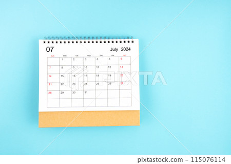 July 2024, Monthly desk calendar for 2024 year on blue background. July 2024, Monthly desk calendar for 2024 year on blue background. 115076114