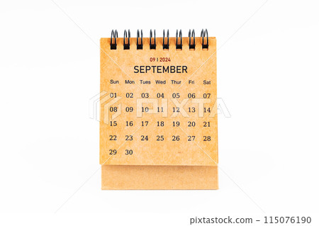 Brown mini desk calendar for September 2024 isolated on white. Brown mini desk calendar for September 2024 isolated on white. 115076190