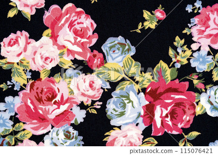 Red rose on black fabric background, Fragment of colorful retro. 115076421