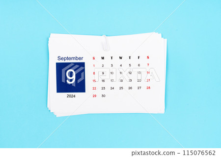 September Calendar 2024 page on blue background. 115076562
