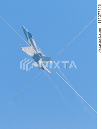 A soaring Spanish Air Force EF-18A Hornet 115077396