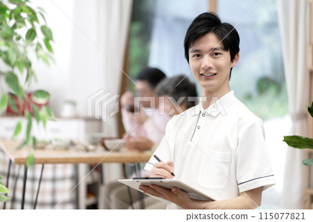 young male caregiver young male caregiver 115077821