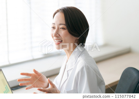 A female doctor who consults A female doctor who consults 115077842