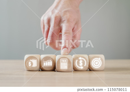 Payroll concept, Hand holding wooden block on desk with payroll icon on virtual screen. Payroll concept, Hand holding wooden block on desk with payroll icon on virtual screen. 115078011