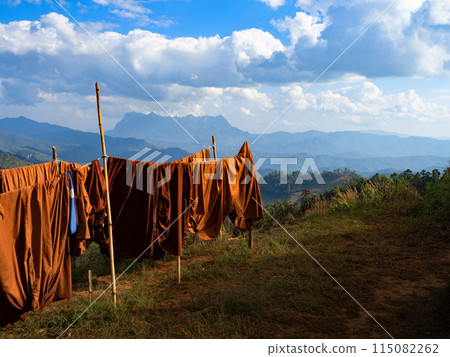 Doi Luang Chiang Dao mountain and hanging clothes under the sun 115082262