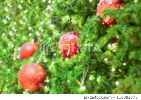 Abstract blurred christmas tree with bokeh light background Abstract blurred christmas tree with bokeh light background 115082573