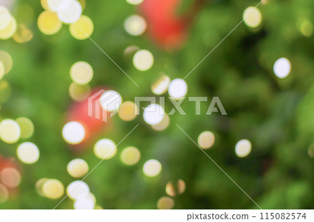 Abstract blurred christmas tree with bokeh light background Abstract blurred christmas tree with bokeh light background 115082574