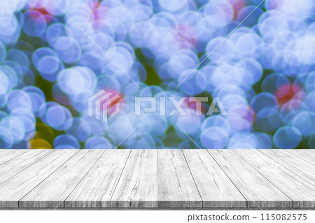 Empty wood table top with blur Christmas tree with bokeh light background Empty wood table top with blur Christmas tree with bokeh light background 115082575