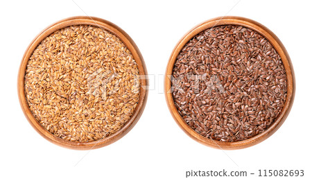 Golden and brown flax seeds in wooden bowls. Whole common flax or linseed, Linum usitatissimum, rich in omega-3 fatty acids, used as a nutritional supplement, or for linseed oil. Isolated, food photo. 115082693