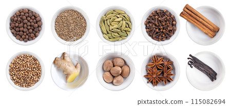 Spices and scents of Christmas season and of winter holidays, in white bowls. Upper row allspice, anise, cardamom, cloves and cinnamon. Bottom row coriander, ginger, nutmeg, star anise and vanilla. Spices and scents of Christmas season and of winter holidays, in white bowls. Upper row allspice, anise, cardamom, cloves and cinnamon. Bottom row coriander, ginger, nutmeg, star anise and vanilla. 115082694