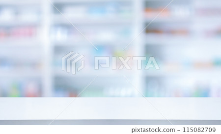 Empty white counter with pharmacy drugstore shelves blurred background 115082709