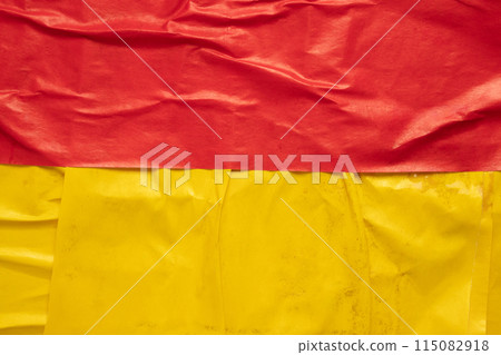 Blank red and yellow crumpled and creased paper poster texture background 115082918