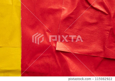 Blank red and yellow crumpled and creased paper poster texture background 115082922