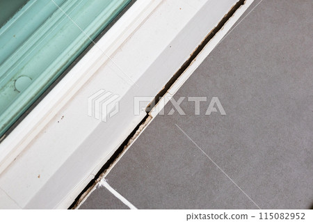 cracked concrete floor of the house cracked concrete floor of the house 115082952