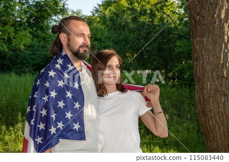 Couple with american flag. USA Independence Day Celebration 115083440