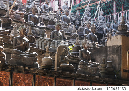 Ancient Buddha statues of Gangaramaya Temple Ancient Buddha statues of Gangaramaya Temple 115083483
