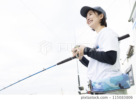 Cute woman enjoying fishing 115083806
