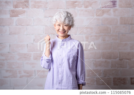 A woman in her 60s enriches her second career after retirement as a senior mentor A woman in her 60s enriches her second career after retirement as a senior mentor 115085076