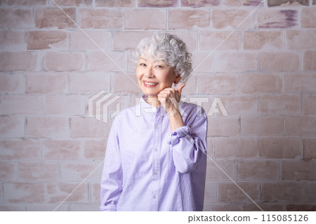 A woman in her 60s enriches her second career after retirement as a senior mentor A woman in her 60s enriches her second career after retirement as a senior mentor 115085126