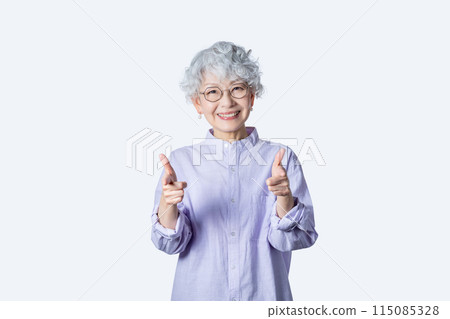 A woman in her 60s enriches her second career after retirement as a senior mentor A woman in her 60s enriches her second career after retirement as a senior mentor 115085328