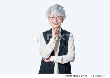 A woman in her 60s enriches her second career after retirement as a senior mentor A woman in her 60s enriches her second career after retirement as a senior mentor 115085332