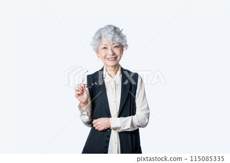 A woman in her 60s enriches her second career after retirement as a senior mentor A woman in her 60s enriches her second career after retirement as a senior mentor 115085335