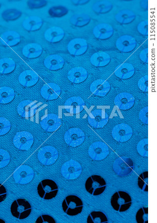 Blue paillette background 115085541