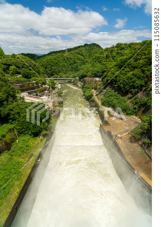 Muddy water from dam discharge 115085632