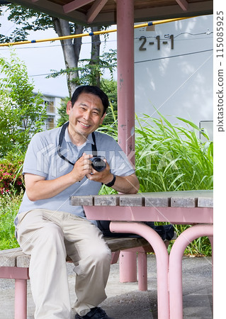Senior man camera lover Senior man camera lover 115085925