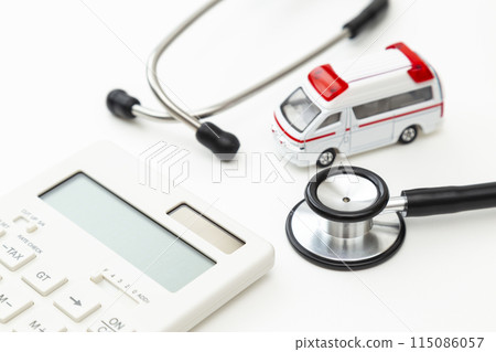 Ambulance, calculator and stethoscope 115086057