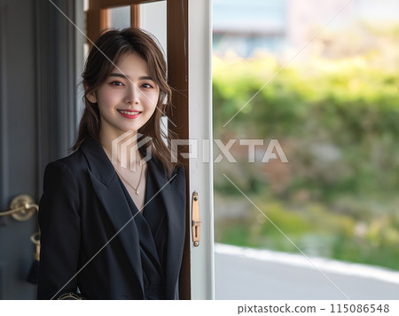 Smiling woman going out 115086548