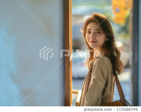 Smiling woman going out Smiling woman going out 115086549
