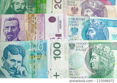 Stack of Serbian Dinar and Polish Zloty 115086872