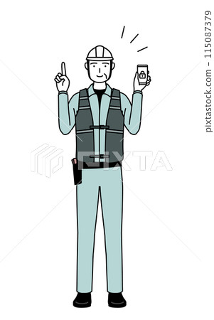 A senior male engineer wearing a helmet and work clothes taking security measures for his smartphone 115087379