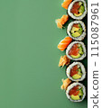 Set of sushi rolls top view over soft green background 115087961