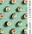 Set of sushi rolls top view over soft green background 115087964