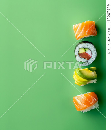 Set of sushi rolls top view over soft green background 115087969